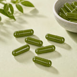 Bild mit eingen grünen Leerkapseln aus Gelatine