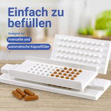 Kapselfüller mit befüllten karamellfarbenen Kapseln, die Kapseln sind geeignet für manuelle und automatische Befüllung