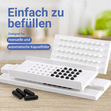 Kapselfüller mit schwarzen Kapseln, die Kapseln sind geeignet für manuelle und automatische Befüllung